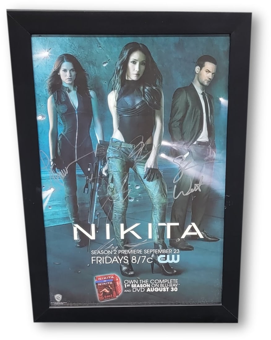 Nikita Cast Signed 11x17 Poster Authenticated by JSA Maggie Q Fonseca West: Nikita Cast Signed 11x17 Poster Authenticated by JSA Maggie Q Fonseca West This 11x17 poster from the series Nikita is custom framed and features authentic signatures from Maggie Q, Lyndsy Fonseca, Sh