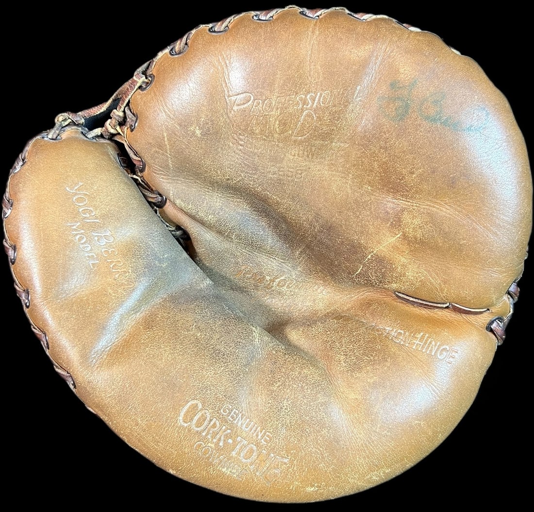 Yogi Berra Signed 1950s Spalding Catcher's Mitt with JSA COA: Yogi Berra Signed 1950s Spalding Catcher's Mitt with JSA COA This is a vintage 1950's Spalding game model catcher's mitt glove signed by the legendary Yogi Berra, a key player for the New York Yankees