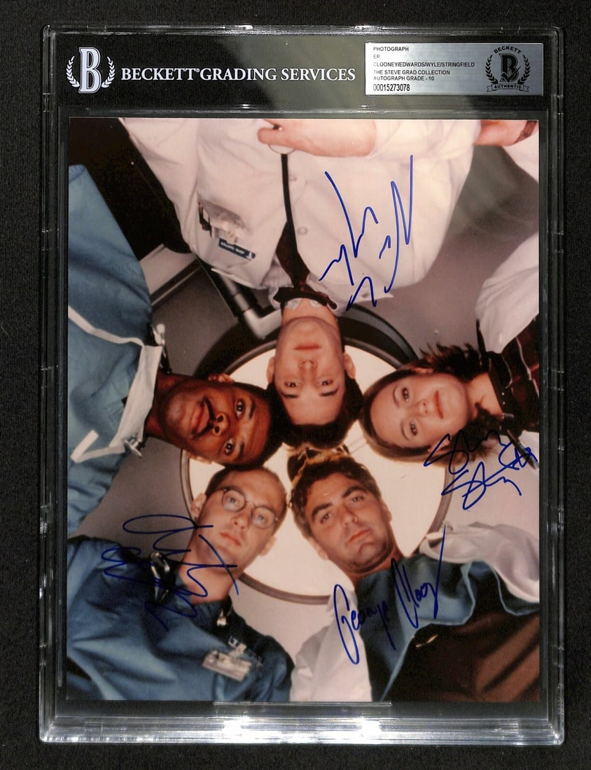 ER Cast Autographed 8x10 Photo Beckett Graded 10 Clooney Wyle Edwards Stringfield: ER Cast Autographed 8x10 Photo Beckett Graded 10 Clooney Wyle Edwards Stringfield This remarkable 8x10 color photograph features the autographs of four iconic cast members from the ER TV series, inclu
