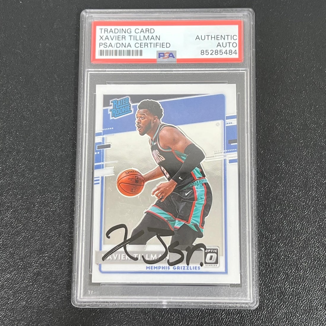 2020-21 Panini Donruss Optic #185 Xavier Tillman Autographed Card PSA/DNA: 2020-21 Panini Donruss Optic #185 Xavier Tillman Autographed Card PSA/DNA This 2020-21 Panini Donruss Optic #185 card features the signature of Xavier Tillman, a notable player for the Memphis Grizzli