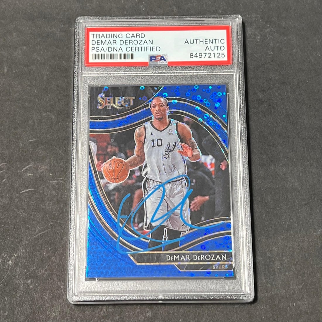 2020-21 Panini Select #220 DeMar DeRozan Signed Card PSA Authenticated Spurs: 2020-21 Panini Select #220 DeMar DeRozan Signed Card PSA Authenticated Spurs This listing features a 2020-21 Panini Select #220 trading card signed by DeMar DeRozan, a prominent player for the San Ant