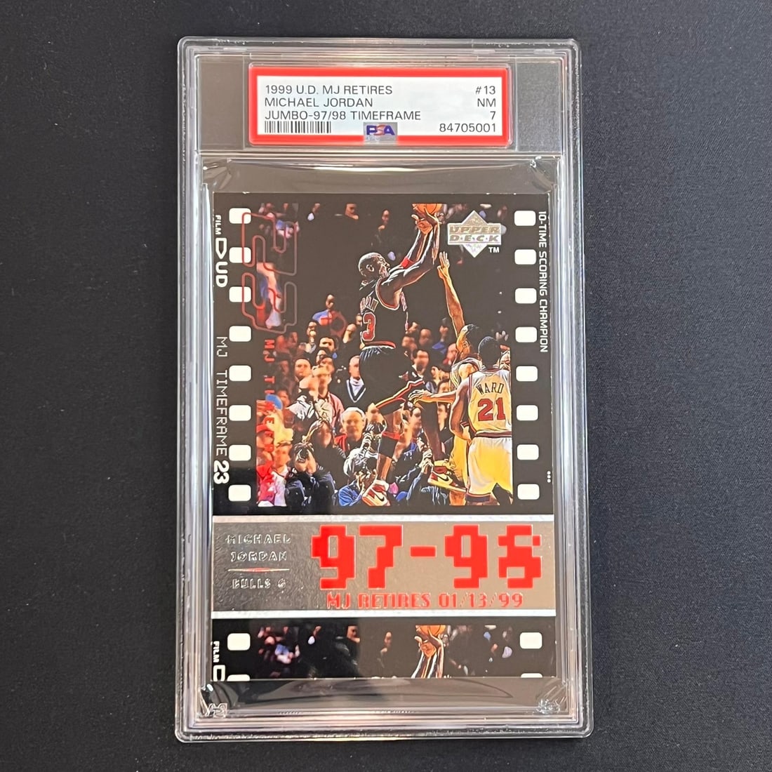 1999 Upper Deck Michael Jordan Jumbo #13 PSA NM 7 Graded Card: 1999 Upper Deck Michael Jordan Jumbo #13 PSA NM 7 Graded Card Celebrate the legacy of basketball legend Michael Jordan with this 1999 Upper Deck MJ Retires Jumbo-97/98 Timeframe #13 trading card. Prof