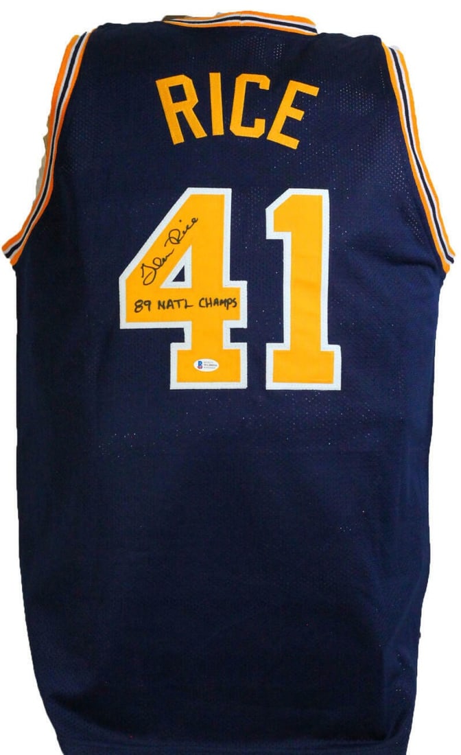 Michigan Wolverines Glen Rice signed blue G Money jersey Beckett: Michigan Wolverines Glen Rice signed blue G Money jersey Beckett This pre-owned blue Michigan Wolverines jersey is autographed by Glen Rice and features an inscription. The autograph has been authenti