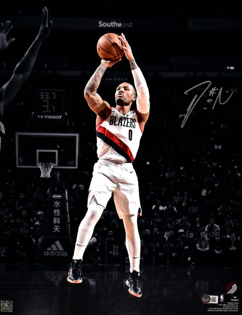 Damian Lillard Autographed 16x20 Trail Blazers Photo BAS Hologram: Damian Lillard Autographed 16x20 Trail Blazers Photo BAS Hologram This is a 16x20 spotlight jump shot photo featuring Damian Lillard of the Portland Trail Blazers. The photo is hand-signed by Damian L