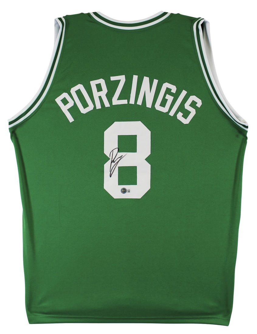 Kristaps Porzingis Signed Green Celtics Jersey Beckett Witnessed Authentication: Kristaps Porzingis Signed Green Celtics Jersey Beckett Witnessed Authentication This green pro style jersey has been personally signed by Kristaps Porzingis of the Boston Celtics. The autograph was wi
