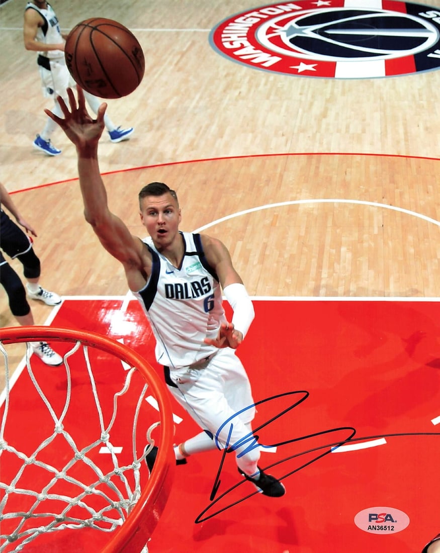 Kristaps Porzingis Signed 11x14 Photo PSA/DNA Mavericks Knicks: Kristaps Porzingis Signed 11x14 Photo PSA/DNA Mavericks Knicks This is an original 11x14 photograph signed by Kristaps Porzingis, a prominent player known for his time with the Dallas Mavericks. The a