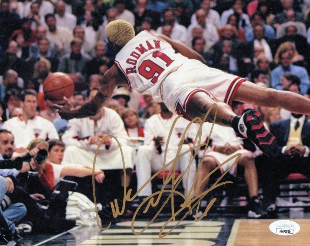 Dennis Rodman Autographed 8X10 Photo Chicago Bulls JSA Authenticated: Dennis Rodman Autographed 8X10 Photo Chicago Bulls JSA Authenticated This is an original 8x10 photograph of Dennis Rodman, capturing a dynamic diving save during his time with the Chicago Bulls. The p