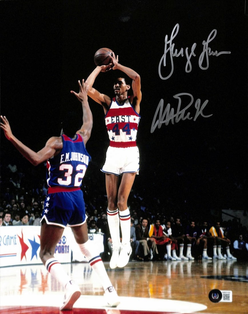 11x14 Beckett LOA dual signed NBA photo Magic Johnson George Gervin: 11x14 Beckett LOA dual signed NBA photo Magic Johnson George Gervin This 11x14 basketball photograph features the bold silver signatures of NBA Hall of Famers Magic Johnson and George Gervin. Capturin