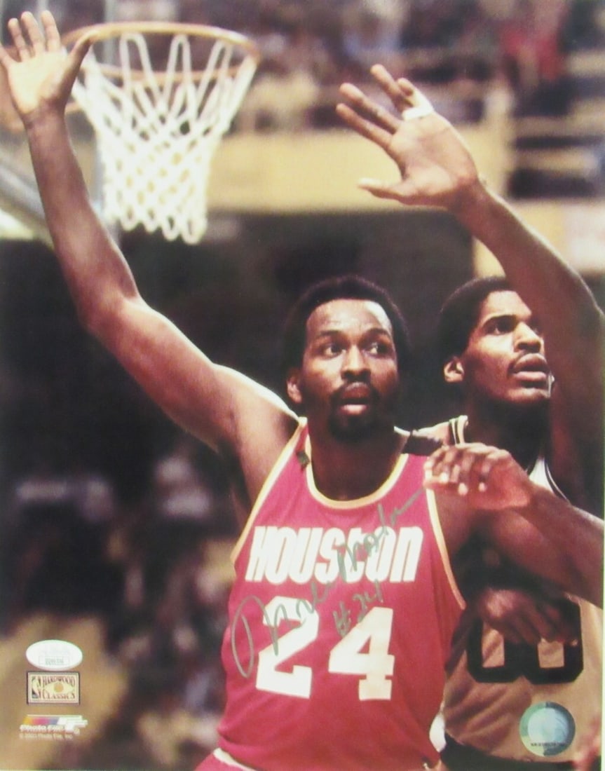 Moses Malone Autographed 11x14 Photo Houston Rockets JSA Certified: Moses Malone Autographed 11x14 Photo Houston Rockets JSA Certified This is a signed 11x14 photo of Moses Malone, featuring the legendary basketball player in his Houston Rockets uniform. The photo is 