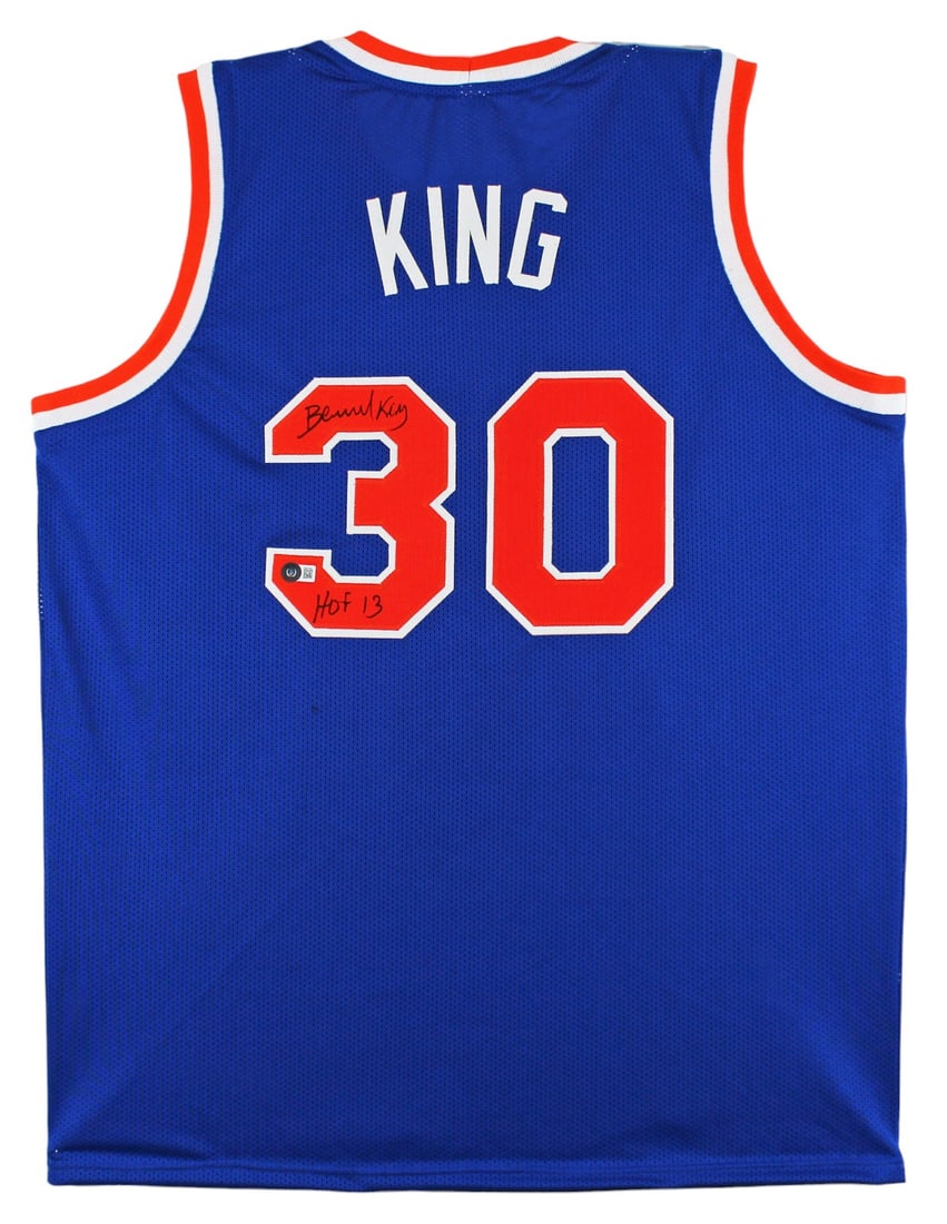 Bernard King Signed Blue Knicks Jersey With HOF 13 Inscription BAS Witness: Bernard King Signed Blue Knicks Jersey With HOF 13 Inscription BAS Witness This blue pro style jersey has been personally signed by Bernard King of the New York Knicks and features the inscription "HO