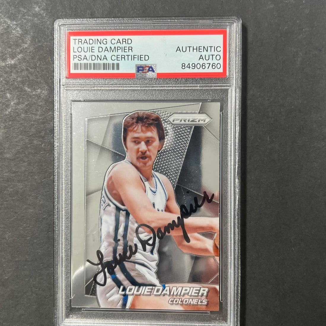 2014-15 Panini Prizm #165 Louie Dampier Autographed Card PSA/DNA Kentucky Colonels: 2014-15 Panini Prizm #165 Louie Dampier Autographed Card PSA/DNA Kentucky Colonels This 2014-15 Panini Prizm #165 card features the autograph of Louie Dampier, a prominent player for the Kentucky Colo