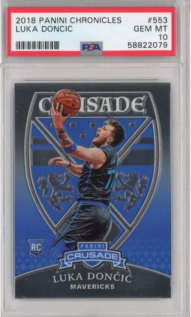 Graded Luka Doncic 2018-19 Panini Chronicles Rookie Card PSA 10: Graded Luka Doncic 2018-19 Panini Chronicles Rookie Card PSA 10 Graded 2018-19 Panini Chronicles Luka Doncic #553 Crusade Rookie RC Basketball Card, rated PSA 10 Gem Mint. This card features Luka Donc