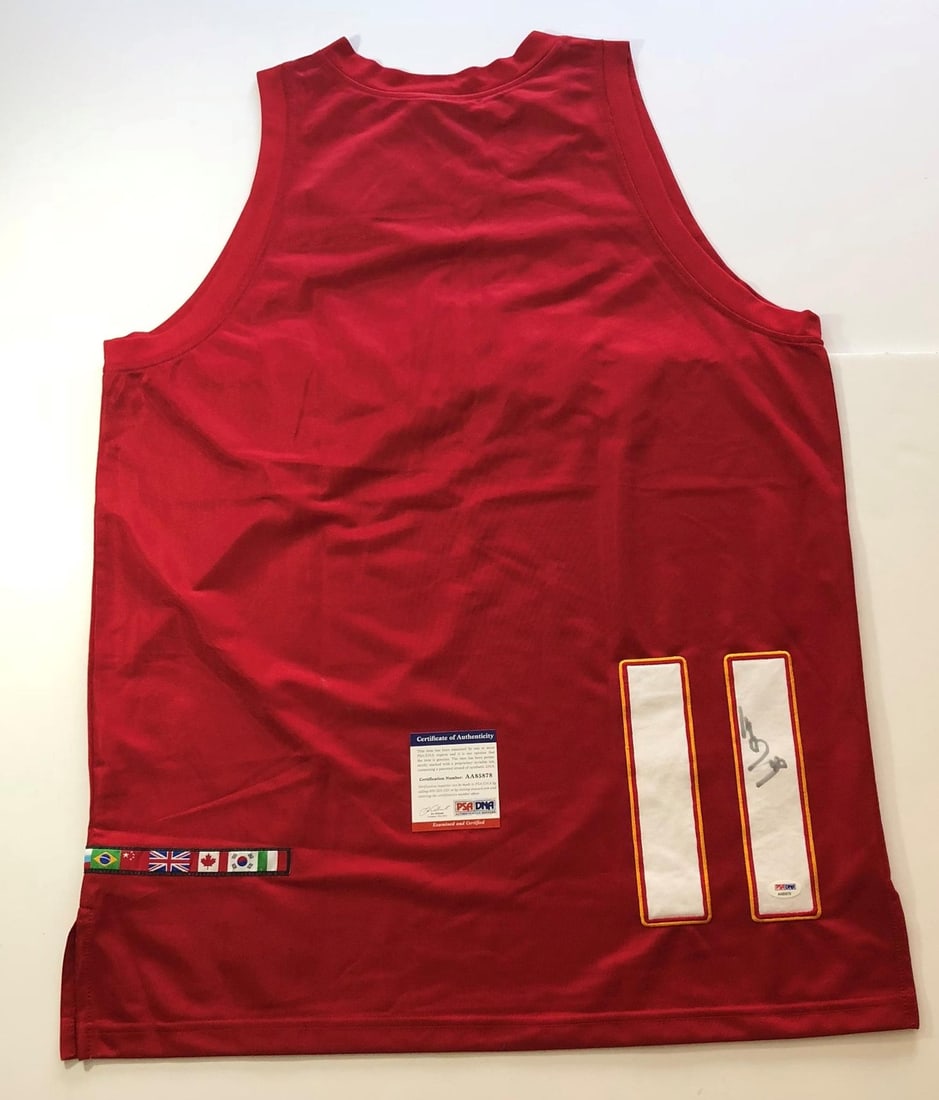 Yao Ming Autographed Jersey PSA/DNA Team China Basketball: Yao Ming Autographed Jersey PSA/DNA Team China Basketball This is a pre-owned stitched jersey autographed by Yao Ming, a prominent player for the Chinese National Basketball Team. The authenticity of 