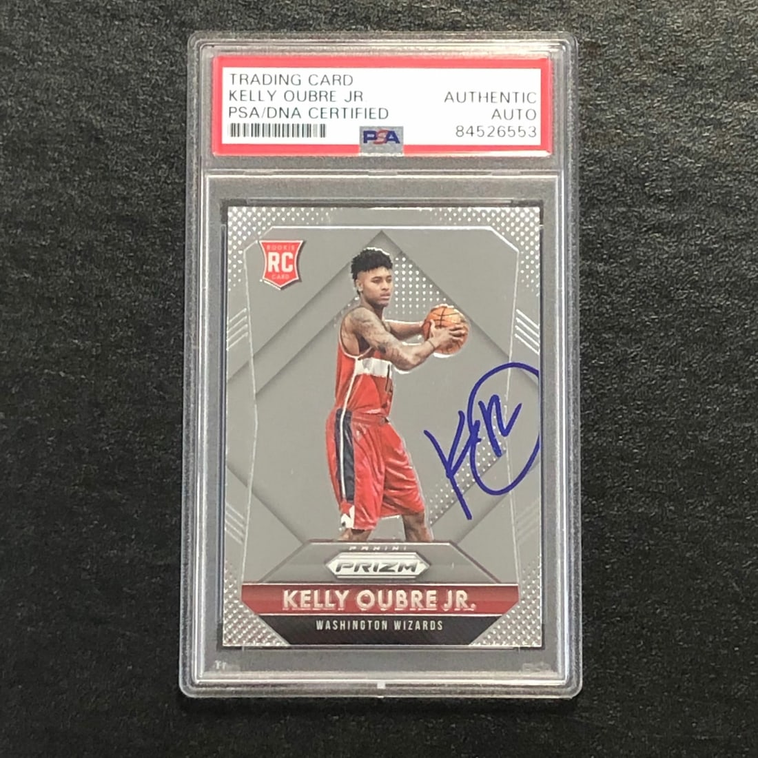 Kelly Oubre Jr. Autographed 2015-16 Prizm Rookie Card Authenticated by PSA: Kelly Oubre Jr. Autographed 2015-16 Prizm Rookie Card Authenticated by PSA This is a 2015-16 Panini Prizm #309 rookie card featuring Kelly Oubre Jr., who played for the Washington Wizards. The card ha