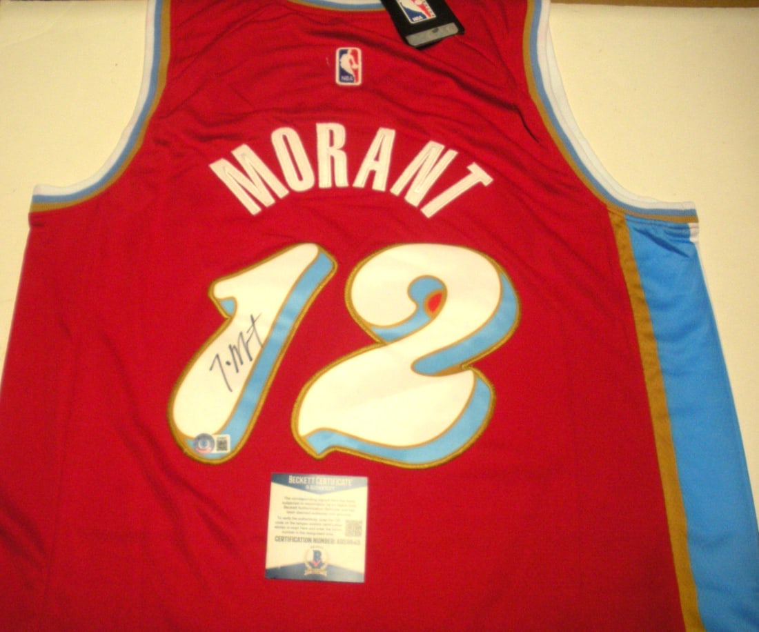 Signed Mitchell Ness Grizzlies Jersey Ja Morant Beckett COA: Signed Mitchell Ness Grizzlies Jersey Ja Morant Beckett COA This is an officially licensed Mitchell & Ness Memphis basketball jersey signed by Ja Morant. The jersey comes with Beckett Certificate of A