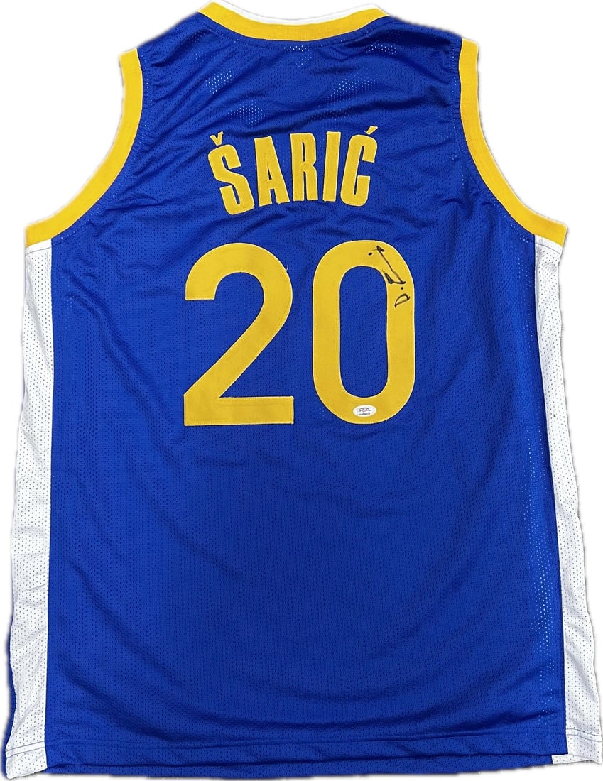 Dario Saric Autographed Jersey PSA/DNA Golden State Warriors: Dario Saric Autographed Jersey PSA/DNA Golden State Warriors This authentic Golden State Warriors jersey is autographed by Dario Saric, showcasing his signature on the stitched fabric. The autograph h