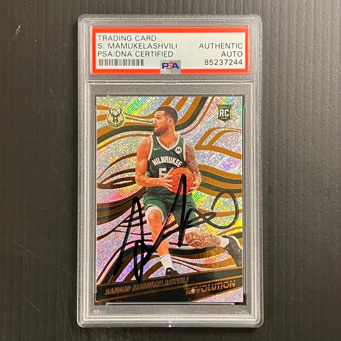 2020-2021 Panini Prizm #142 Sandro Mamukelashvili Signed Card PSA/DNA: 2020-2021 Panini Prizm #142 Sandro Mamukelashvili Signed Card PSA/DNA This listing features a 2020-2021 Panini Prizm #142 trading card, autographed by Sandro Mamukelashvili, a notable player for the M
