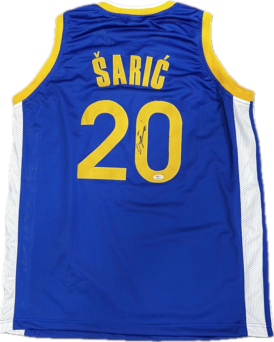 Dario Saric Autographed Jersey PSA/DNA Golden State Warriors Original: Dario Saric Autographed Jersey PSA/DNA Golden State Warriors Original This original autographed jersey features the signature of Dario Saric, a player for the Golden State Warriors. The jersey is stit