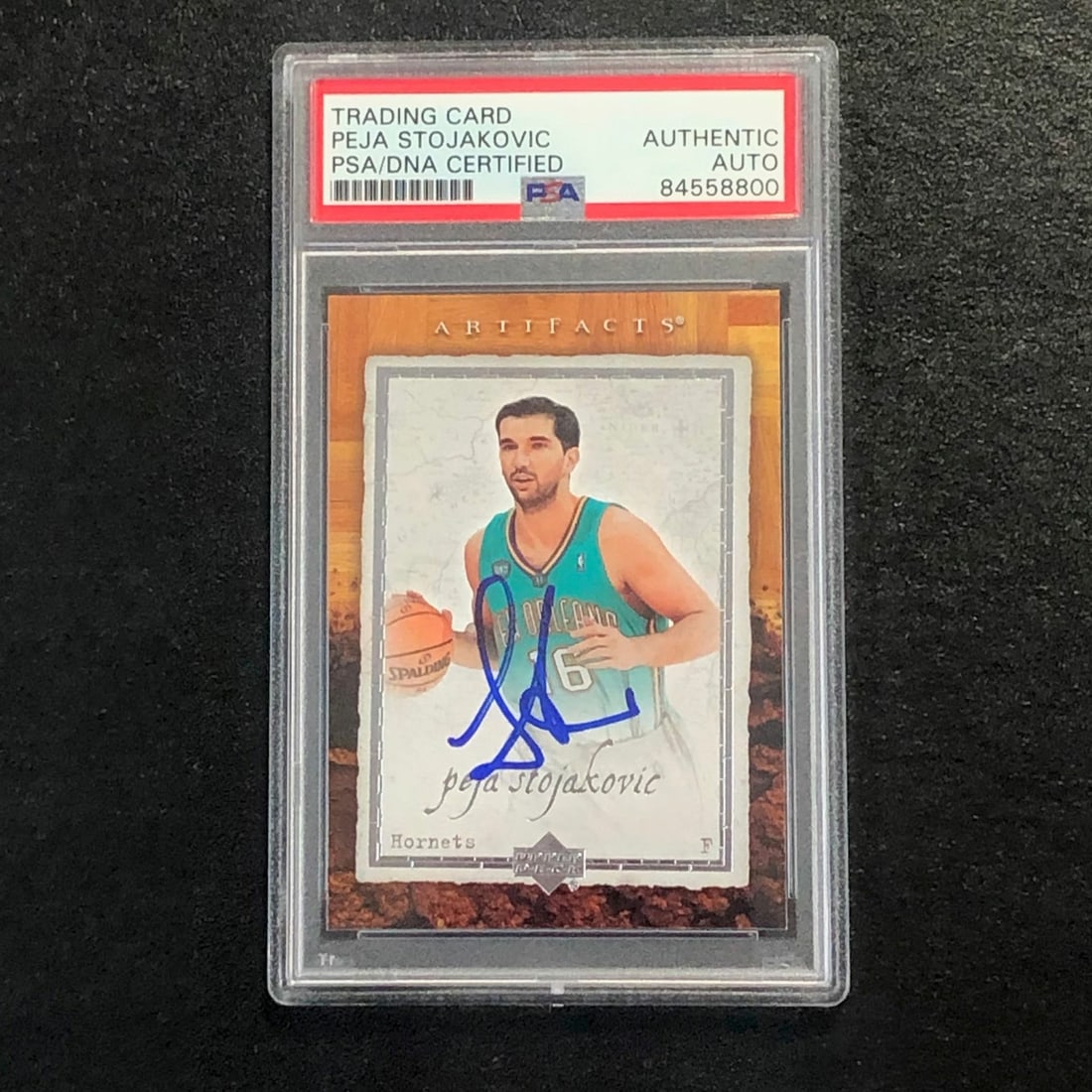 Peja Stojakovic Autographed 2007-08 Artifacts Basketball Card PSA/DNA Authenticated: Peja Stojakovic Autographed 2007-08 Artifacts Basketball Card PSA/DNA Authenticated This is a 2007-08 Artifacts Basketball #60 trading card featuring Peja Stojakovic. The card has been signed by Peja 