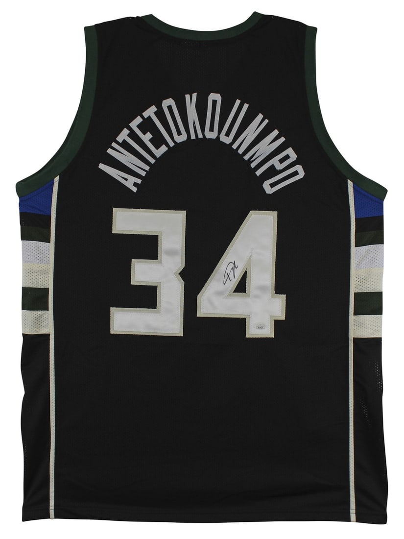 Giannis Antetokounmpo Bucks signed black pro style jersey JSA: Giannis Antetokounmpo Bucks signed black pro style jersey JSA This black pro style jersey has been personally signed by Giannis Antetokounmpo of the Milwaukee Bucks. The jersey is a custom-stitched, n