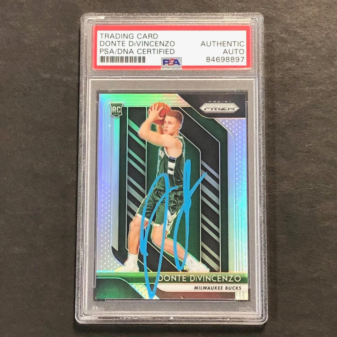 Donte DiVincenzo Rookie Card Panini Prizm Signed PSA DNA Authenticated: Donte DiVincenzo Rookie Card Panini Prizm Signed PSA DNA Authenticated This is a 2018-19 Panini Prizm #246 trading card featuring Donte DiVincenzo, who played for the Milwaukee Bucks. The card has bee