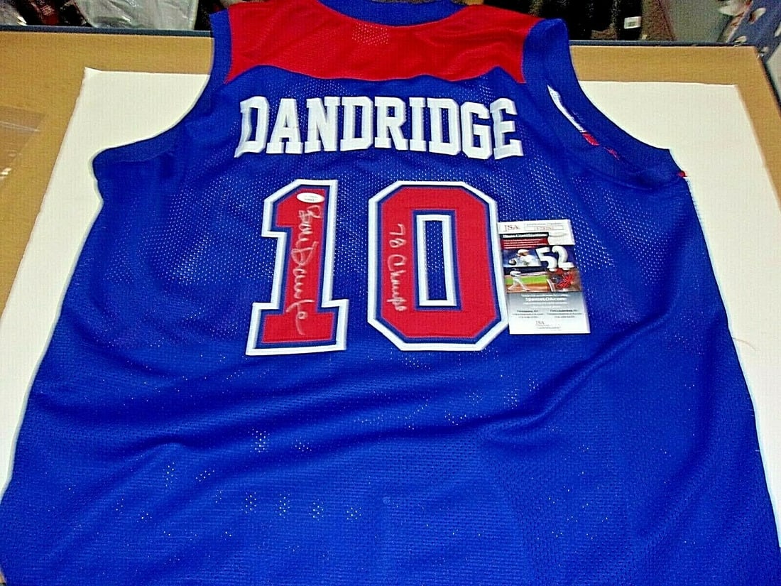 Signed Bob Dandridge Washington Bullets 1978 Champion Jersey With JSA COA: Signed Bob Dandridge Washington Bullets 1978 Champion Jersey With JSA COA This is a pre-owned Washington Bullets blue jersey signed by Bob Dandridge, commemorating the team's 1978 NBA Championship. Th