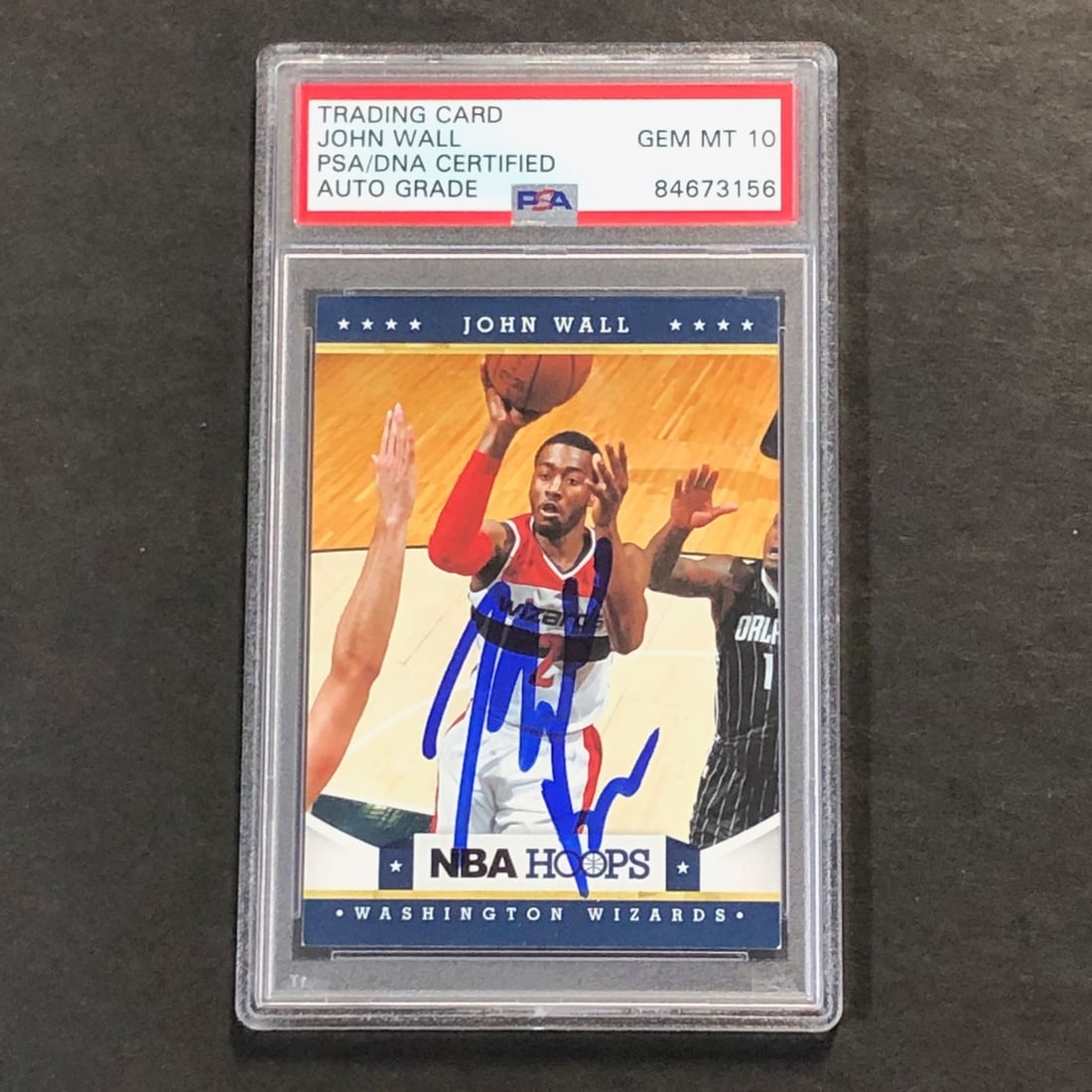2012-13 NBA Hoops #172 John Wall Signed Card PSA/DNA Authentic Wizards: 2012-13 NBA Hoops #172 John Wall Signed Card PSA/DNA Authentic Wizards This is a 2012-13 NBA Hoops #172 trading card featuring John Wall of the Washington Wizards, signed by the player himself. The au