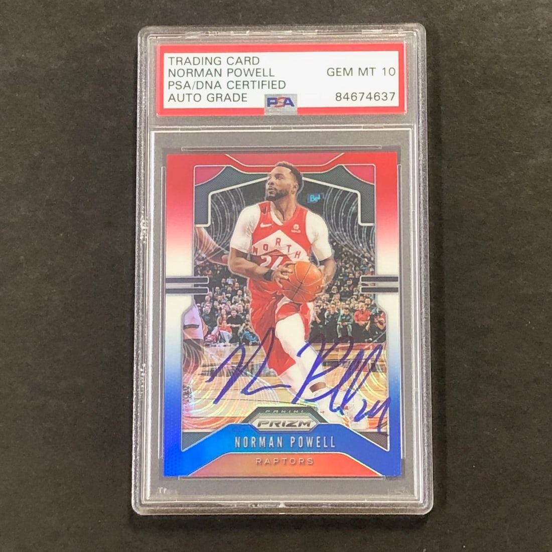 Norman Powell Autographed 2019-20 Prizm Card PSA DNA Authenticated Grade 10: Norman Powell Autographed 2019-20 Prizm Card PSA DNA Authenticated Grade 10 This is a 2019-20 Panini Prizm #159 Red White Blue trading card featuring Norman Powell, who played for the Toronto Raptors.