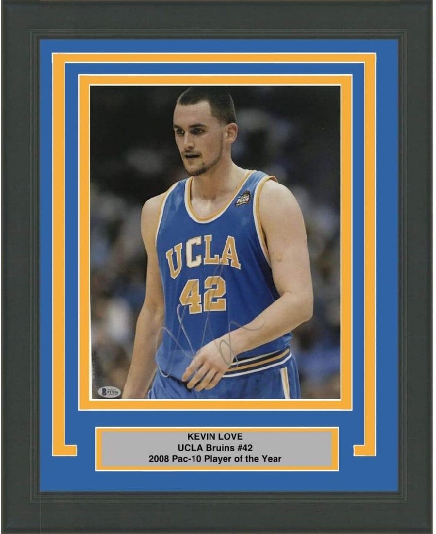 Framed Kevin Love 11x14 UCLA Bruins Photo with Beckett COA: Framed Kevin Love 11x14 UCLA Bruins Photo with Beckett COA This professionally framed and matted 11x14 college photo of Kevin Love, a star player for the UCLA Bruins, showcases his autograph, authenti