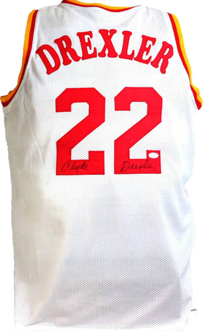 Autographed Portland Trail Blazers Clyde Drexler white pro style jersey JSA: Autographed Portland Trail Blazers Clyde Drexler white pro style jersey JSA This white pro style jersey is autographed by basketball legend Clyde Drexler. The jersey features an authenticated signatur