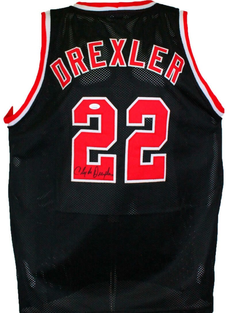 Clyde Drexler Signed Black Pro Style Basketball Jersey JSA: Clyde Drexler Signed Black Pro Style Basketball Jersey JSA This black pro style jersey is autographed by basketball player Clyde Drexler. The signature is authenticated by James Spence Authentication 