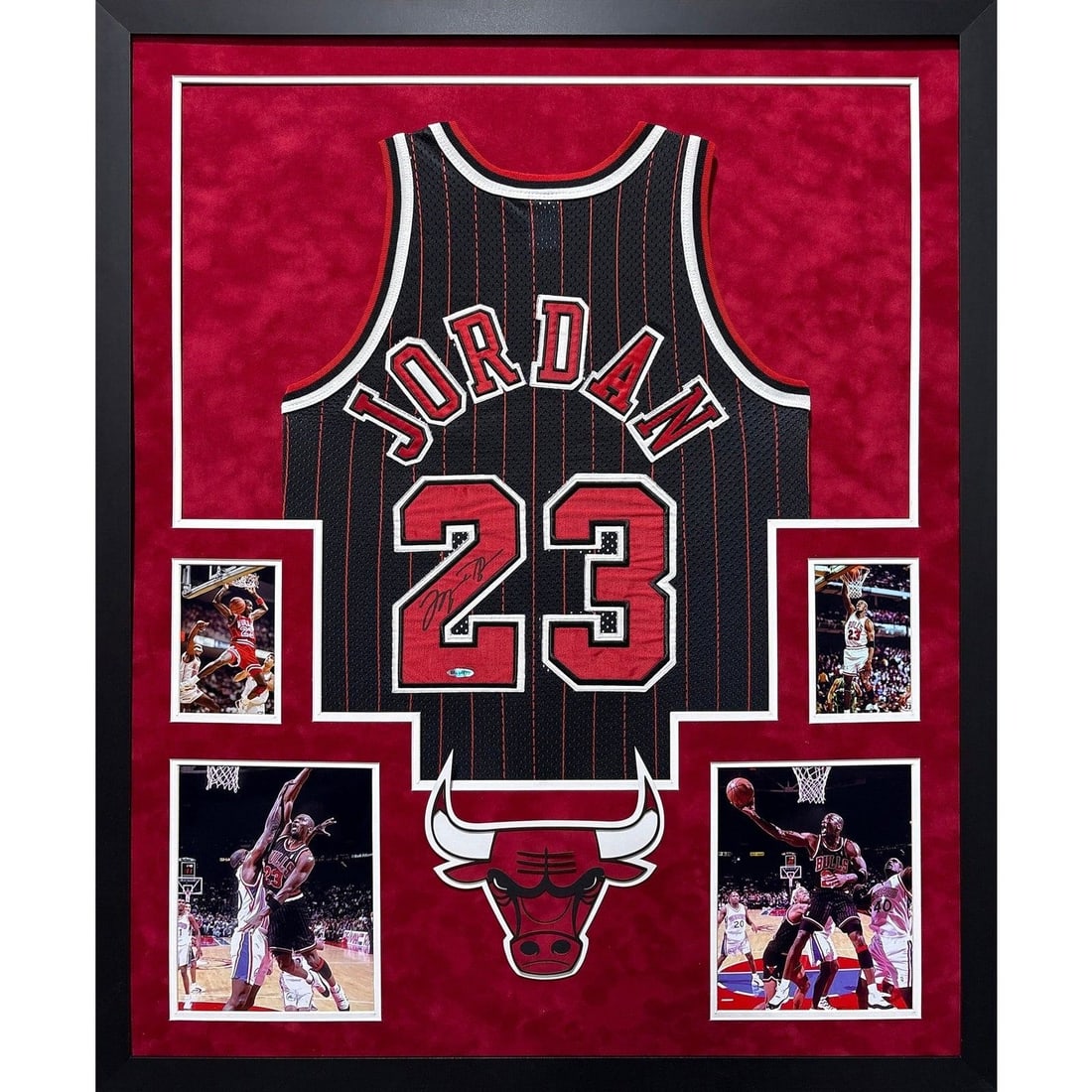 Michael Jordan Autographed Framed Bulls Jersey UDA Authenticated: Michael Jordan Autographed Framed Bulls Jersey UDA Authenticated This autographed Michael Jordan framed jersey is a rare collectible item, authenticated by UDA, the exclusive authenticator for Michael