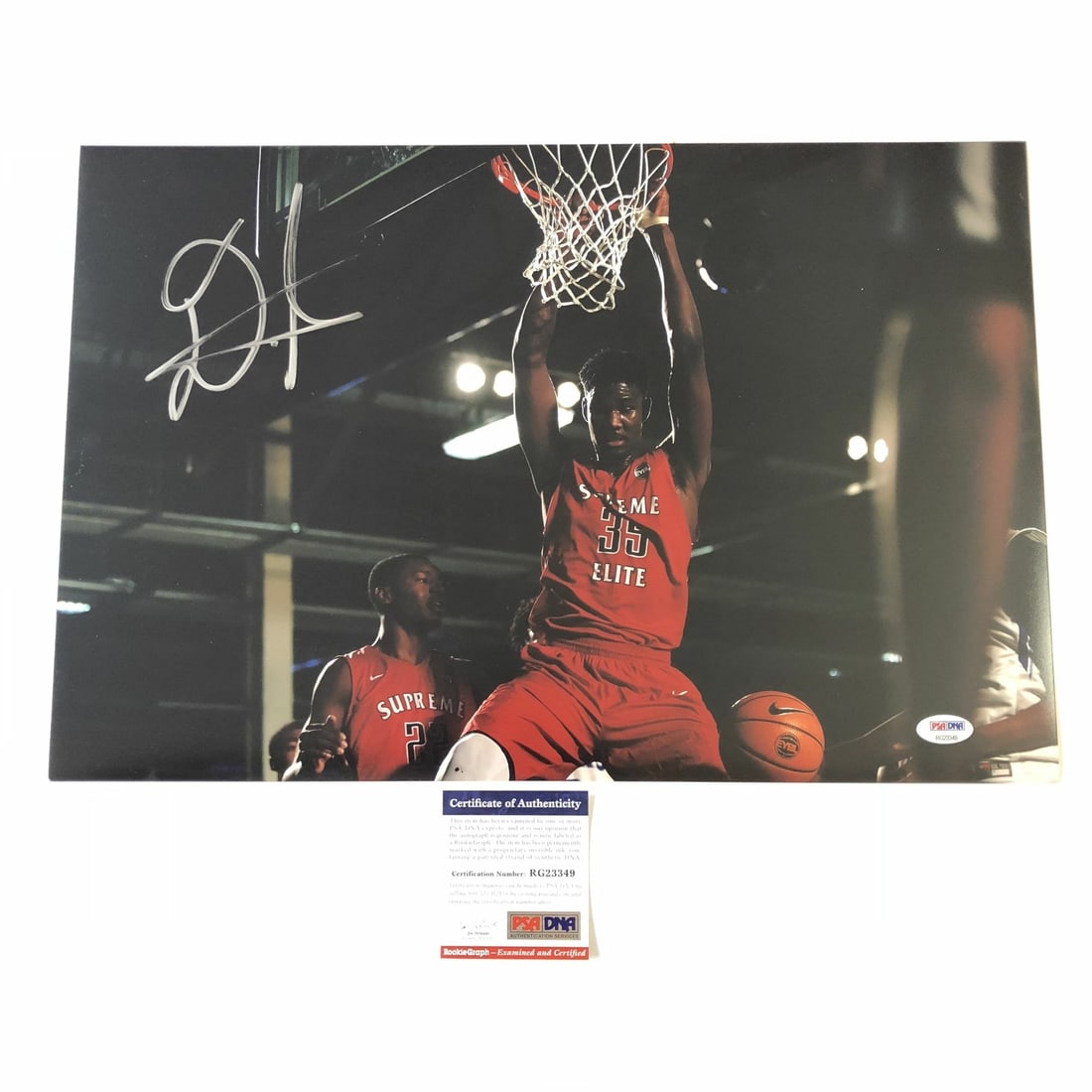 Signed 12x18 DeAndre Ayton Suns Photo PSA DNA: Signed 12x18 DeAndre Ayton Suns Photo PSA DNA This professionally printed 12x18 photograph features the autograph of DeAndre Ayton from the Phoenix Suns. The signature has been authenticated by PSA/DN