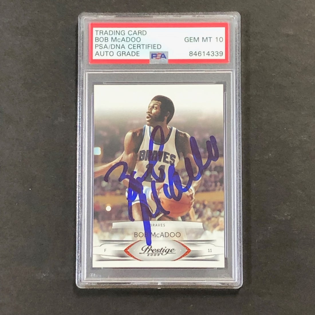 2009-10 Panini Prestige #137 Bob McAdoo Autographed Card PSA Slabbed: 2009-10 Panini Prestige #137 Bob McAdoo Autographed Card PSA Slabbed This is a 2009-10 Panini Prestige #137 basketball card, featuring the signature of Bob McAdoo, a renowned player for the Buffalo Br