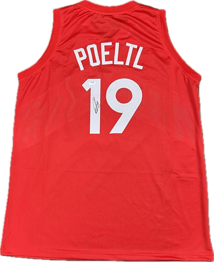 Jakob Poeltl Toronto Raptors Signed Jersey PSA/DNA Authenticated: Jakob Poeltl Toronto Raptors Signed Jersey PSA/DNA Authenticated This is a stitched Toronto Raptors jersey autographed by Jakob Poeltl, a notable player for the team. The signature has been authentica