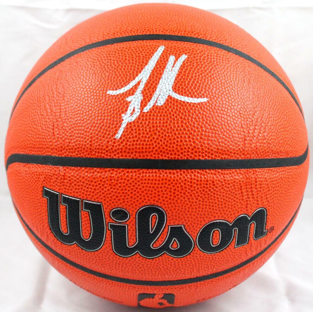 Signed Mike Bibby NBA Wilson Ball Beckett Hologram Silver: Signed Mike Bibby NBA Wilson Ball Beckett Hologram Silver This official NBA Wilson basketball features the authentic autograph of Mike Bibby. The signature is authenticated by Beckett and includes a B