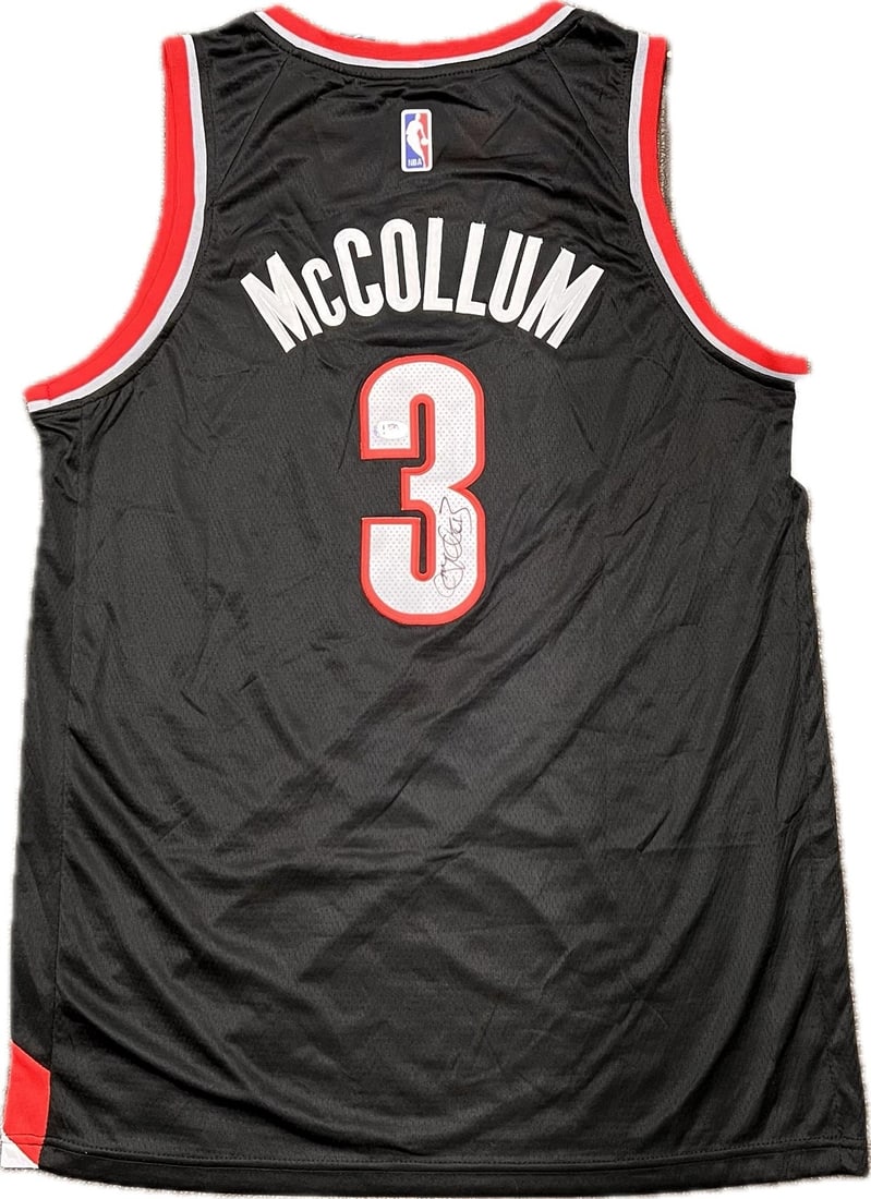 CJ McCollum Autographed Jersey PSA/DNA Portland Trail Blazers: CJ McCollum Autographed Jersey PSA/DNA Portland Trail Blazers This is an original stitched jersey autographed by CJ McCollum, a prominent player for the Portland Trail Blazers. The autograph has been 