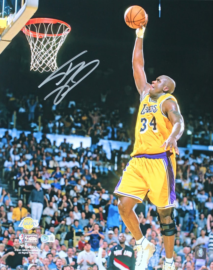 Shaquille O'Neal Signed 16x20 Dunk Photo Vs Blazers BAS Witnessed: Shaquille O'Neal Signed 16x20 Dunk Photo Vs Blazers BAS Witnessed This original 16x20 photo captures Shaquille O'Neal's iconic vertical dunk against the Blazers, personally signed by the basketball le