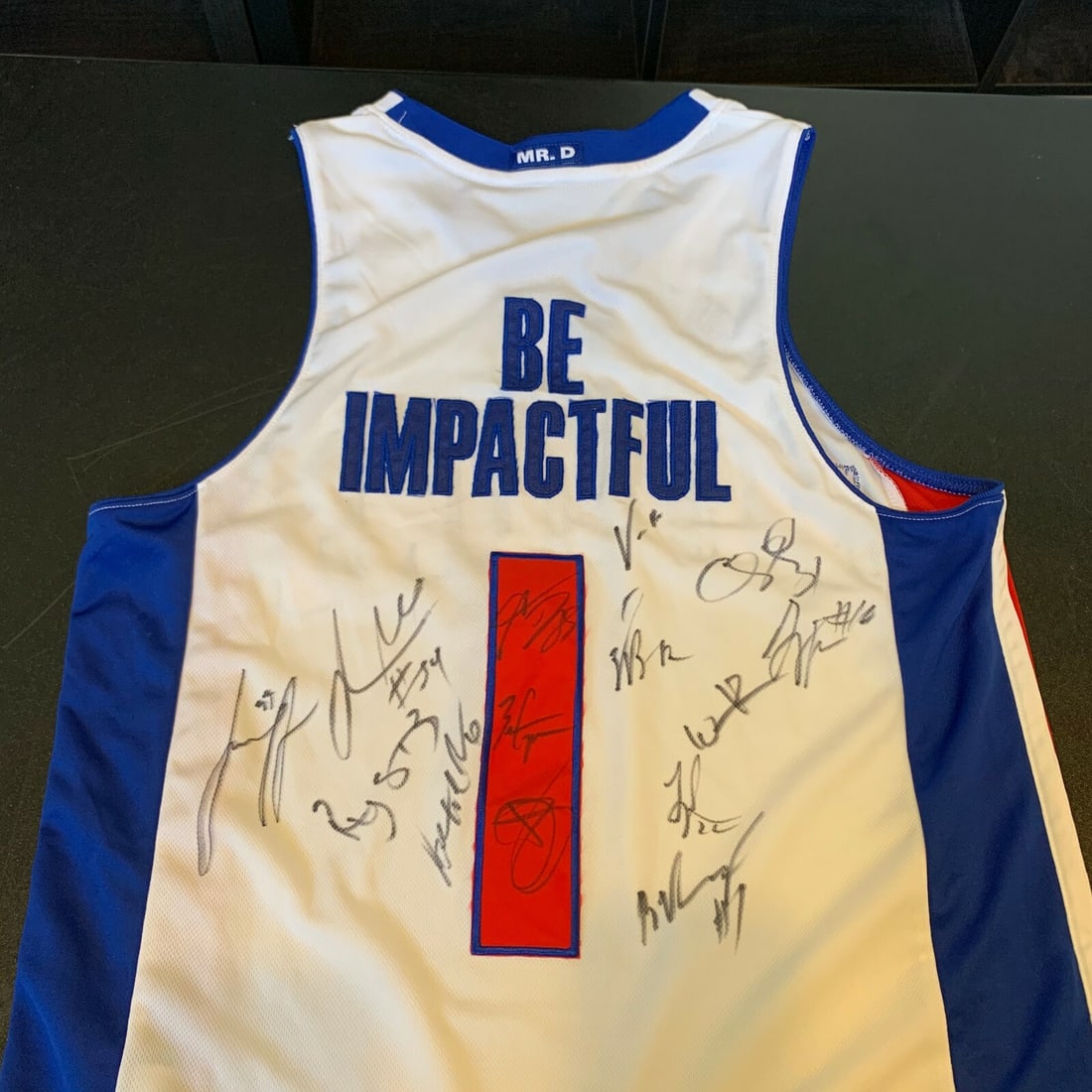 2010 Detroit Pistons Team Signed Authentic Adidas Jersey: 2010 Detroit Pistons Team Signed Authentic Adidas Jersey Own a piece of basketball history with this authentic Adidas jersey from the 2010 Detroit Pistons, featuring the inspirational slogan "Be Impac