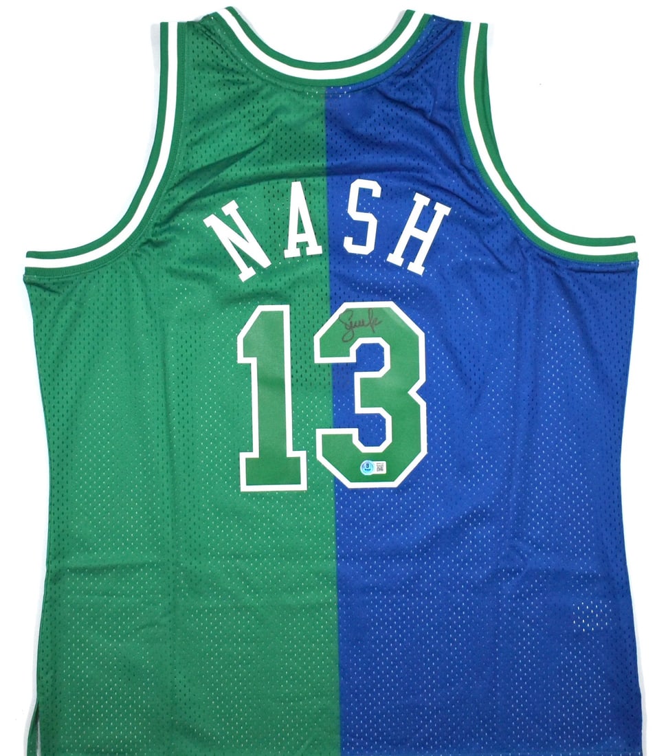 Dallas Mavericks Blue Green Jersey Signed by Steve Nash Beckett Hologram: Dallas Mavericks Blue Green Jersey Signed by Steve Nash Beckett Hologram This is a pre-owned Dallas Mavericks Mitchell & Ness blue and green jersey, signed by Steve Nash. The jersey is an original ite