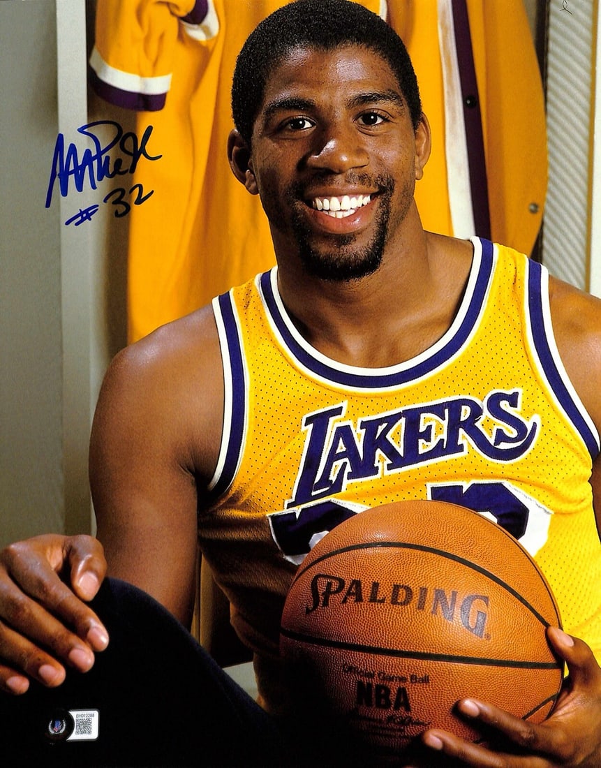Magic Johnson Autographed 11x14 Lakers Photo Beckett Certified: Magic Johnson Autographed 11x14 Lakers Photo Beckett Certified This autographed 11x14 photograph features the legendary Magic Johnson, who is renowned for his remarkable career with the LA Lakers. The