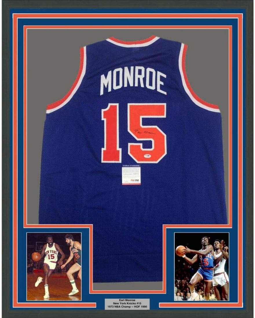 Earl Monroe Signed Knicks Jersey Display With PSA COA and Framed 33x42 Presentation: Earl Monroe Signed Knicks Jersey Display With PSA COA and Framed 33x42 Presentation This professionally framed and matted New York Knicks blue jersey features the authentic autograph of Earl Monroe. T