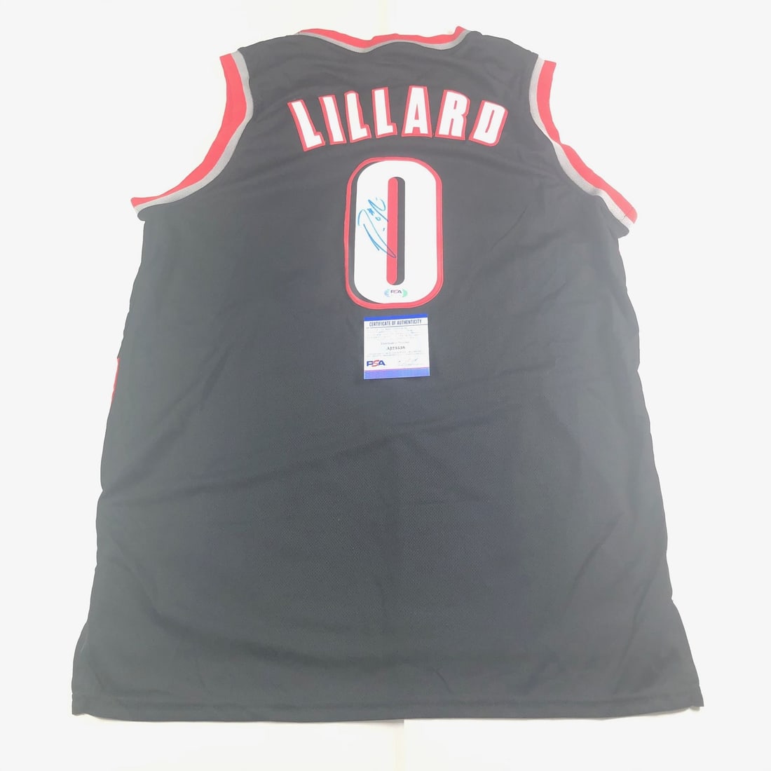 Autographed Damian Lillard Portland Jersey with PSA/DNA Authentication: Autographed Damian Lillard Portland Jersey with PSA/DNA Authentication This pre-owned stitched jersey features the authentic autograph of Damian Lillard from the Portland Trail Blazers. The signature 