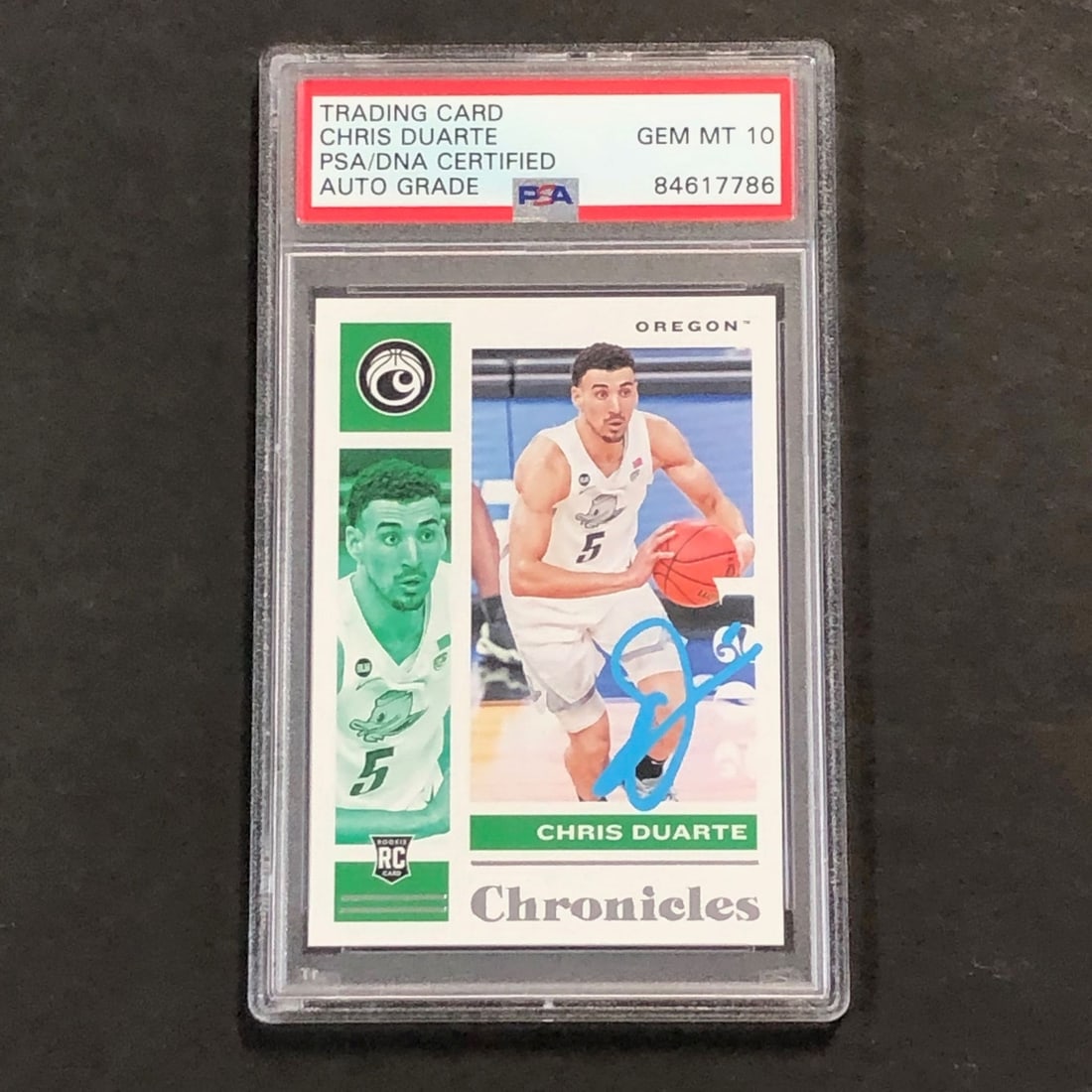 Chris Duarte PSA 10 autographed Chronicles Draft Picks #18 basketball card: Chris Duarte PSA 10 autographed Chronicles Draft Picks #18 basketball card This is a 2021-22 Chronicles Draft Picks #18 basketball card featuring Chris Duarte. The card is hand-signed by Chris Duarte 