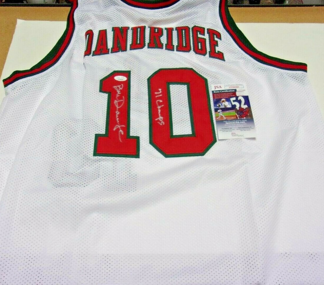 Signed Bob Dandridge Milwaukee Bucks 1971 Champions Jersey With JSA COA: Signed Bob Dandridge Milwaukee Bucks 1971 Champions Jersey With JSA COA This is a pre-owned Milwaukee Bucks basketball jersey signed by Bob Dandridge, commemorating the team's 1971 championship. The j