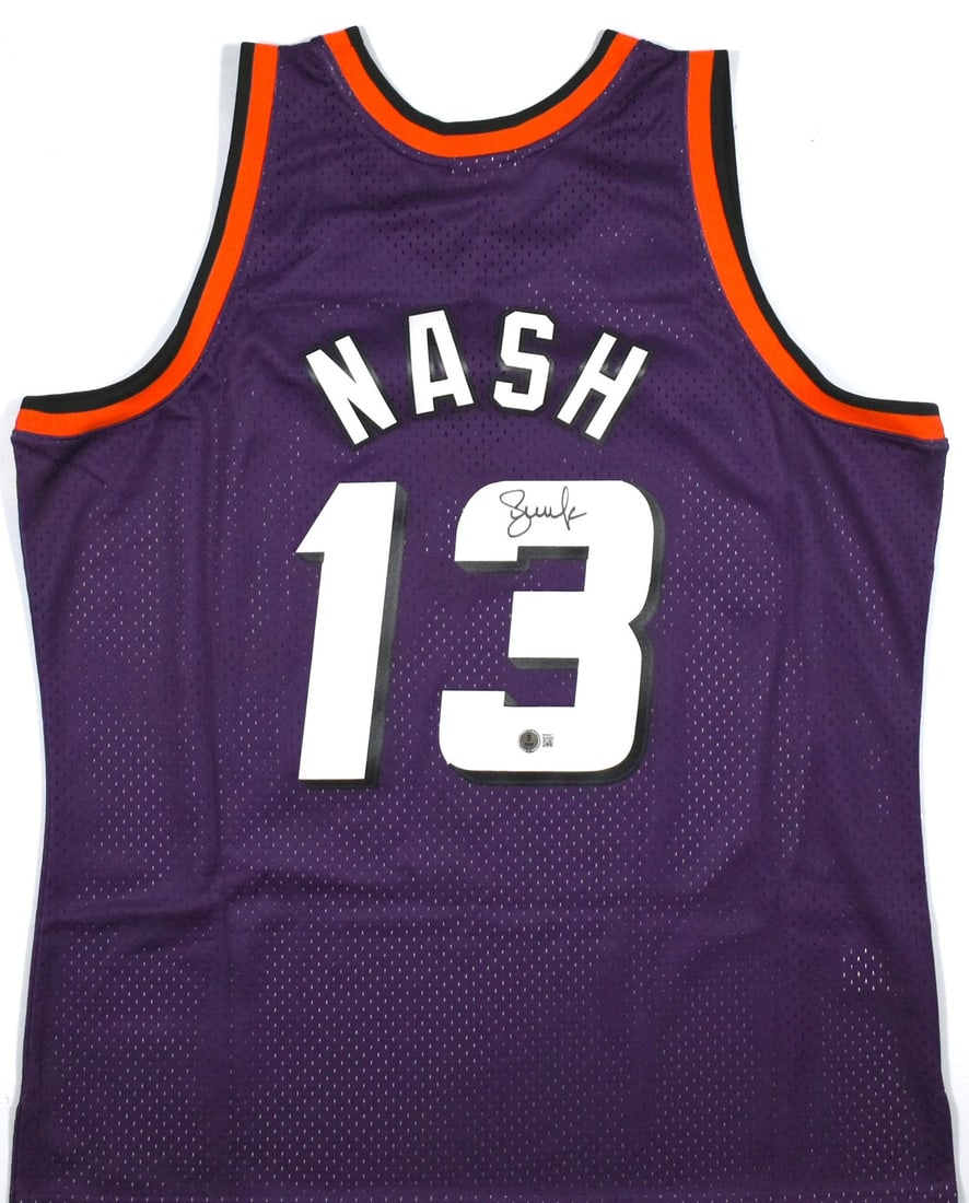 Phoenix Suns Purple Swingman Jersey Signed by Steve Nash Beckett Hologram: Phoenix Suns Purple Swingman Jersey Signed by Steve Nash Beckett Hologram This is a pre-owned Mitchell & Ness Swingman jersey featuring the Phoenix Suns and signed by Steve Nash. The jersey is purple 