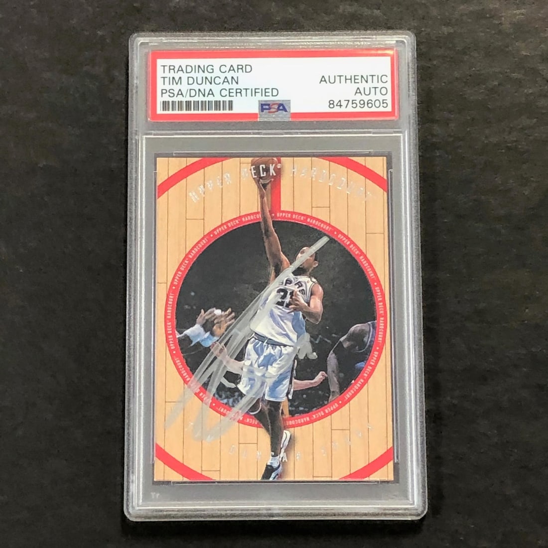 1998-99 Upper Deck Hardcourt Tim Duncan Signed Card PSA Authenticated: 1998-99 Upper Deck Hardcourt Tim Duncan Signed Card PSA Authenticated This is a 1998-99 Upper Deck Hardcourt #63 basketball card featuring the signature of NBA legend Tim Duncan, who is renowned for h