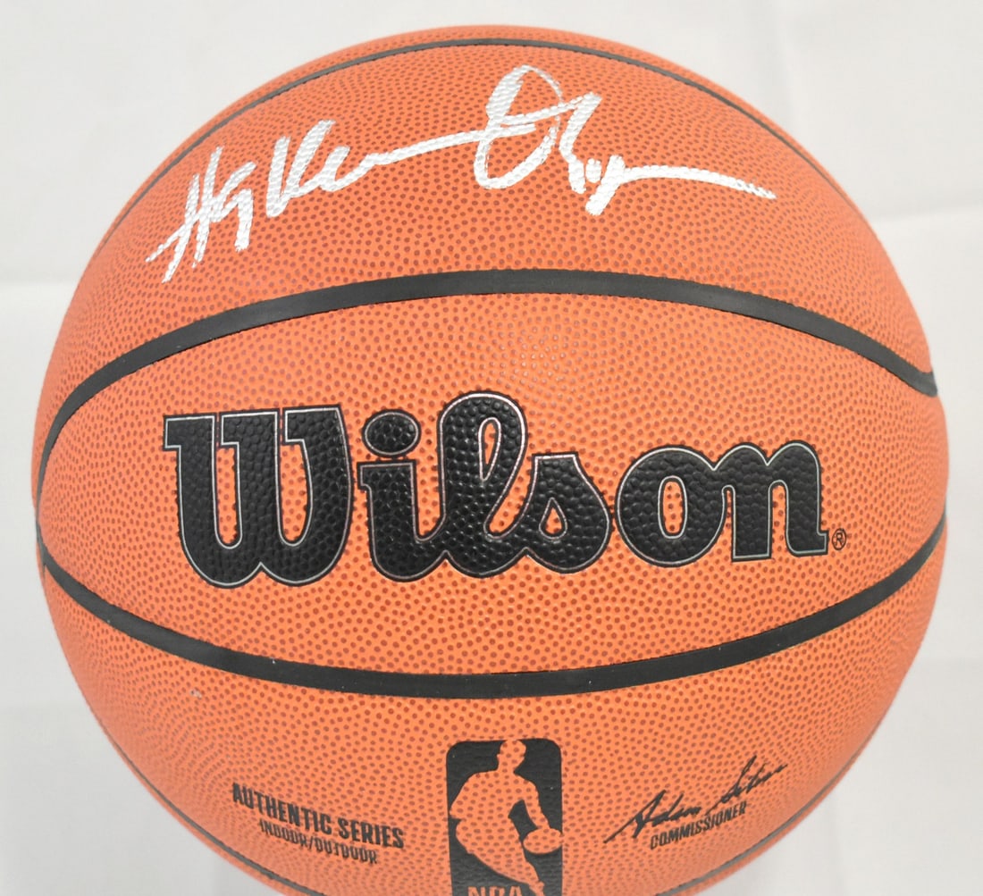 NBA Wilson Basketball Signed by Hakeem Olajuwon with Beckett Hologram: NBA Wilson Basketball Signed by Hakeem Olajuwon with Beckett Hologram This is an original NBA Wilson basketball autographed by Hakeem Olajuwon. The ball is associated with the Houston Rockets and come