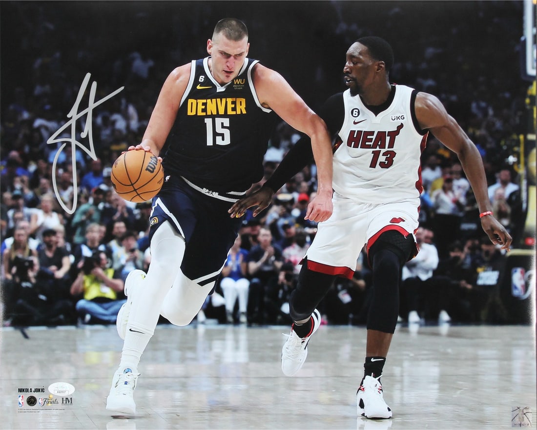 Nikola Jokic Signed 16x20 Photo Vs Heat JSA Certified: Nikola Jokic Signed 16x20 Photo Vs Heat JSA Certified Capture a moment from the game with this authentic signed 16x20 horizontal photo of Nikola Jokic driving against the Heat. This original piece fea