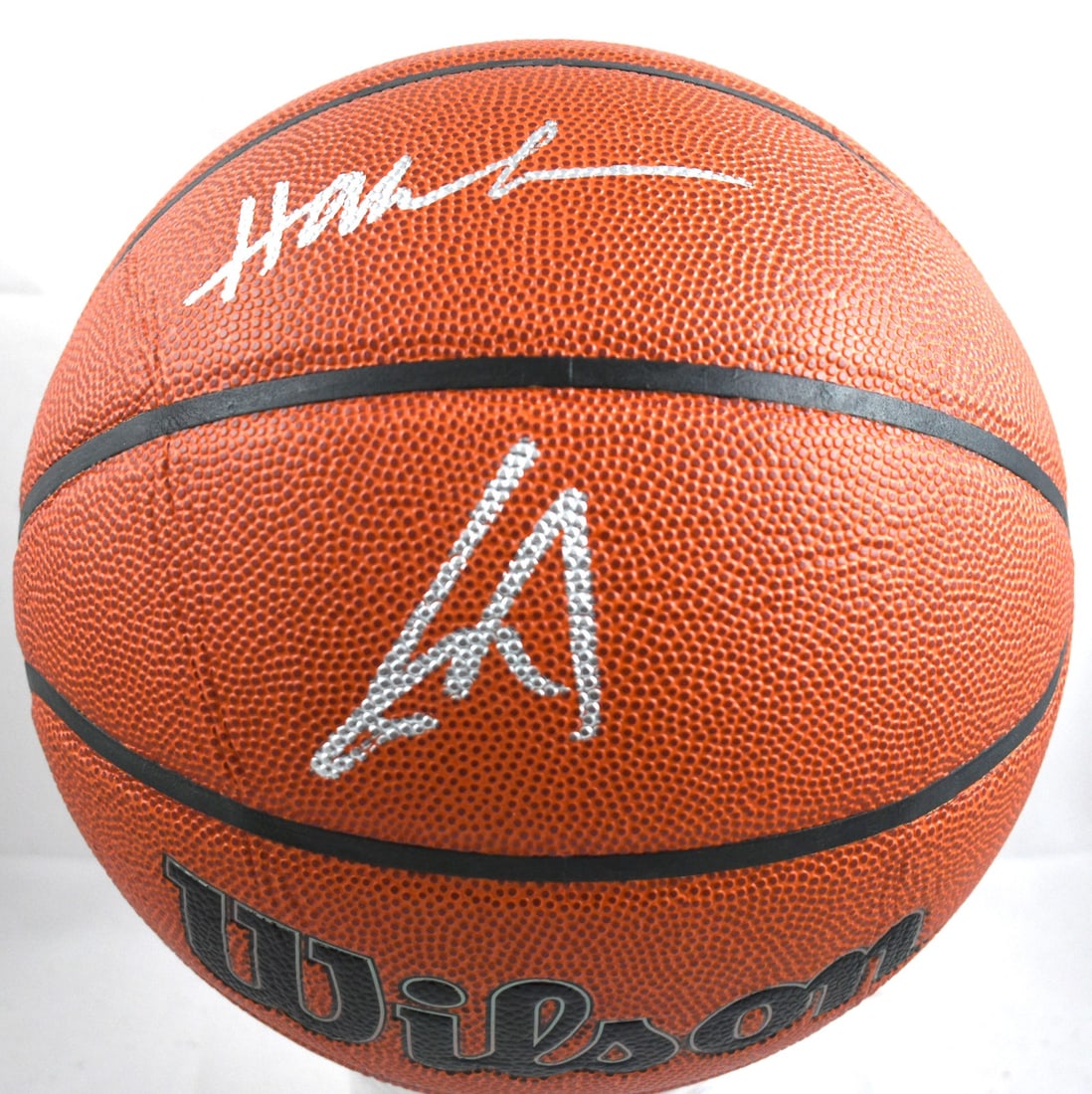Signed Wilson NBA Basketball by Hakeem Olajuwon and Yao Ming Beckett Holo: Signed Wilson NBA Basketball by Hakeem Olajuwon and Yao Ming Beckett Holo This authentic NBA Wilson basketball is signed by both Hakeem Olajuwon and Yao Ming. Representing the Houston Rockets, this or